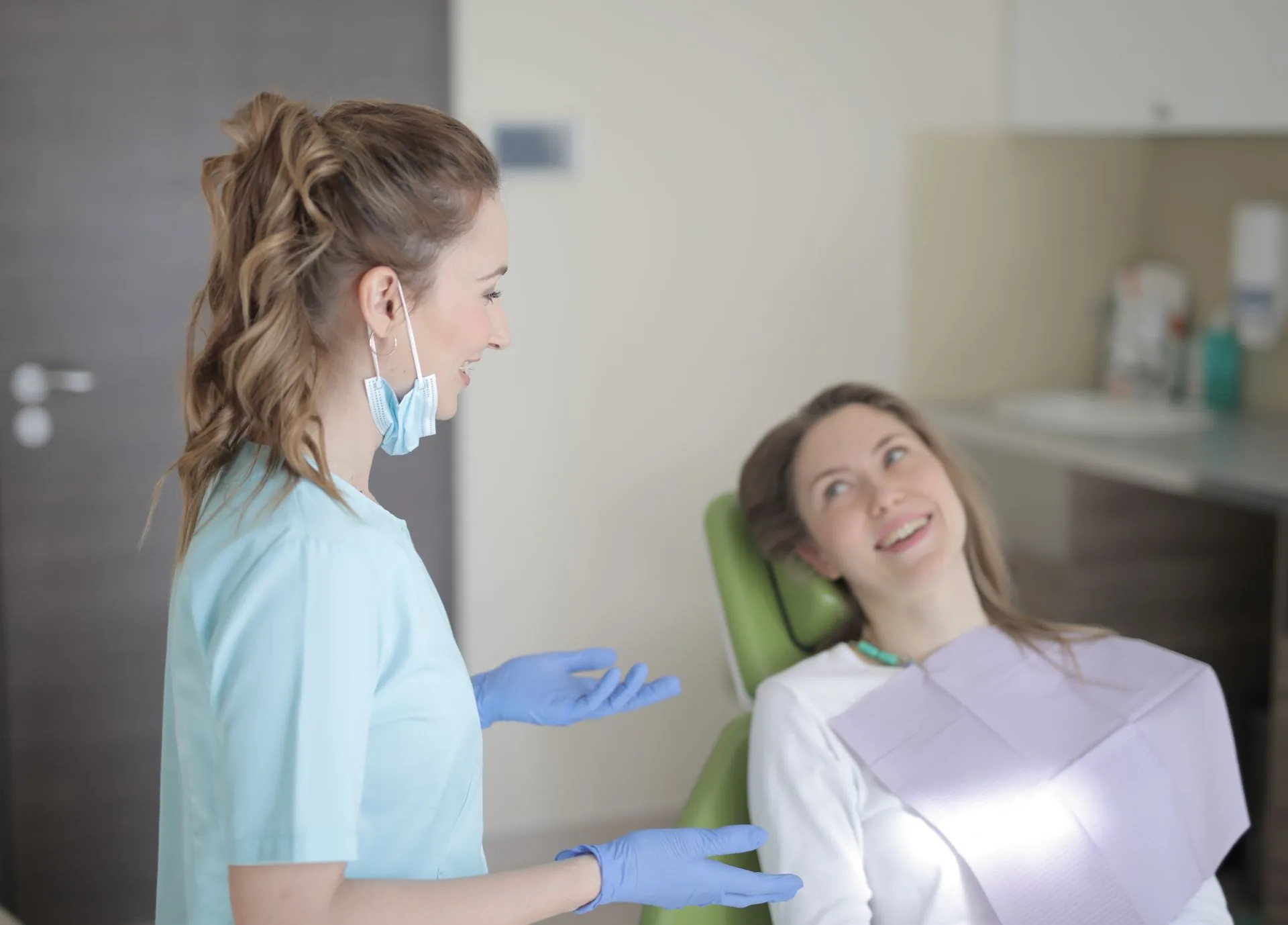 A clinician talking a patient through their treatment plan